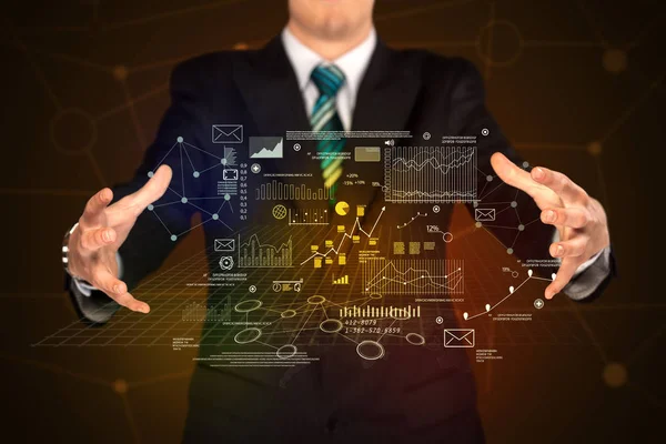 depositphotos_133220646-stock-photo-businessman-holding-business-plan-graphics
